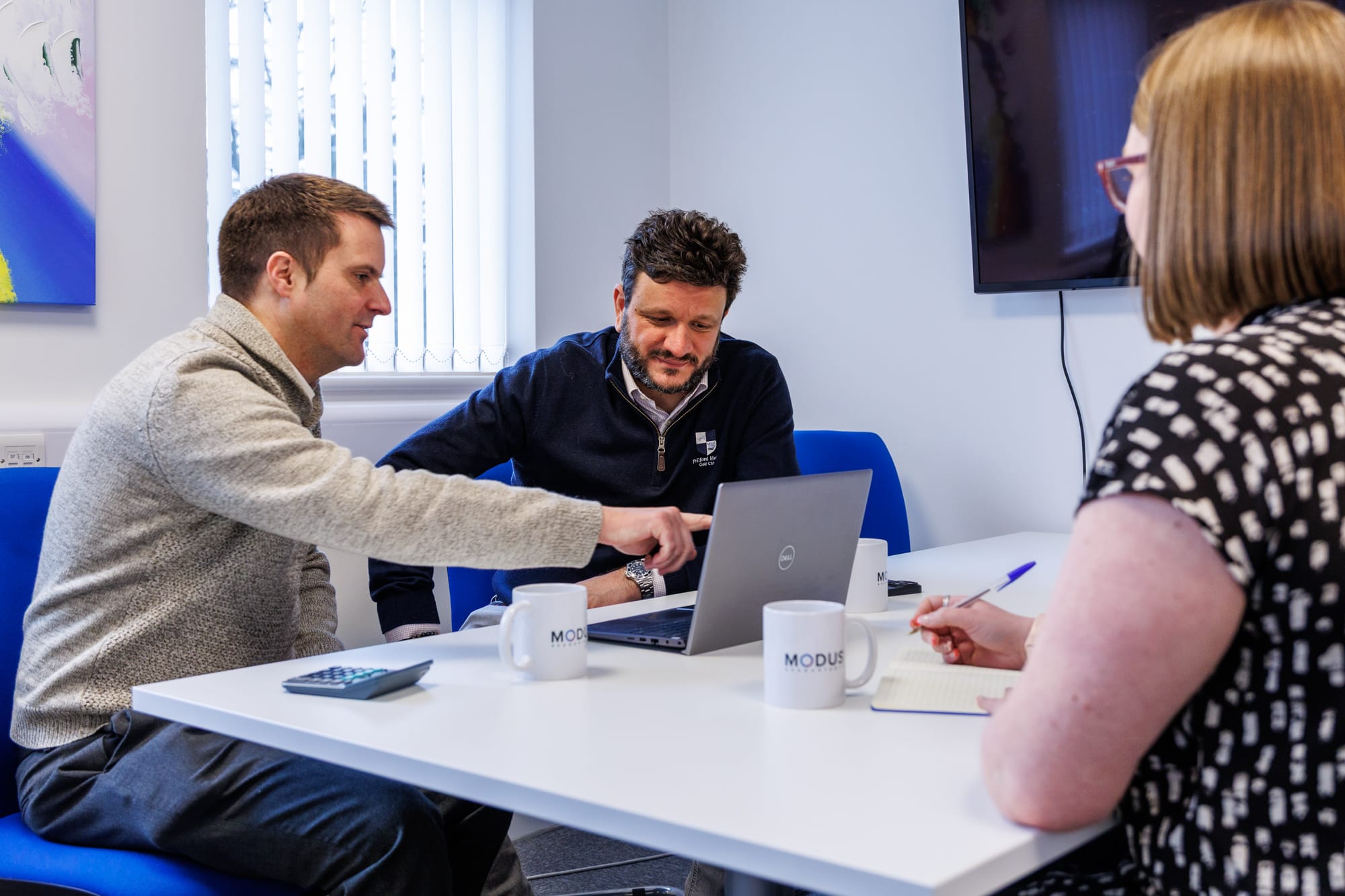the team at modus accountants discussing the next accounting project