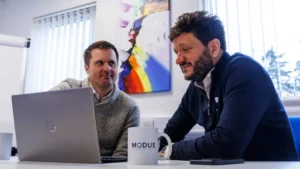 accountants at Modus having morning coffee in the office