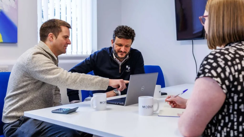 Accountant in the Abingdon office at Frilford discussing a client's accounting setup.